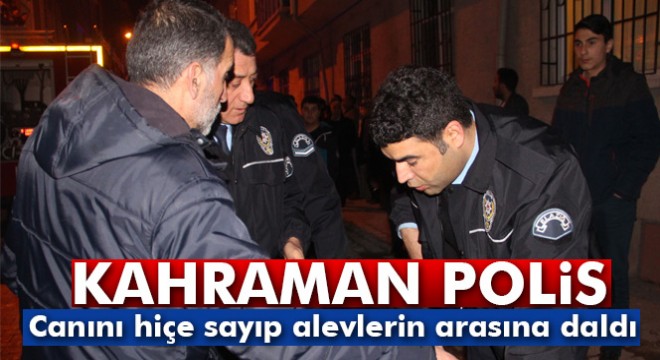 Polis yaralı kadını alevlerin arasından kurtardı